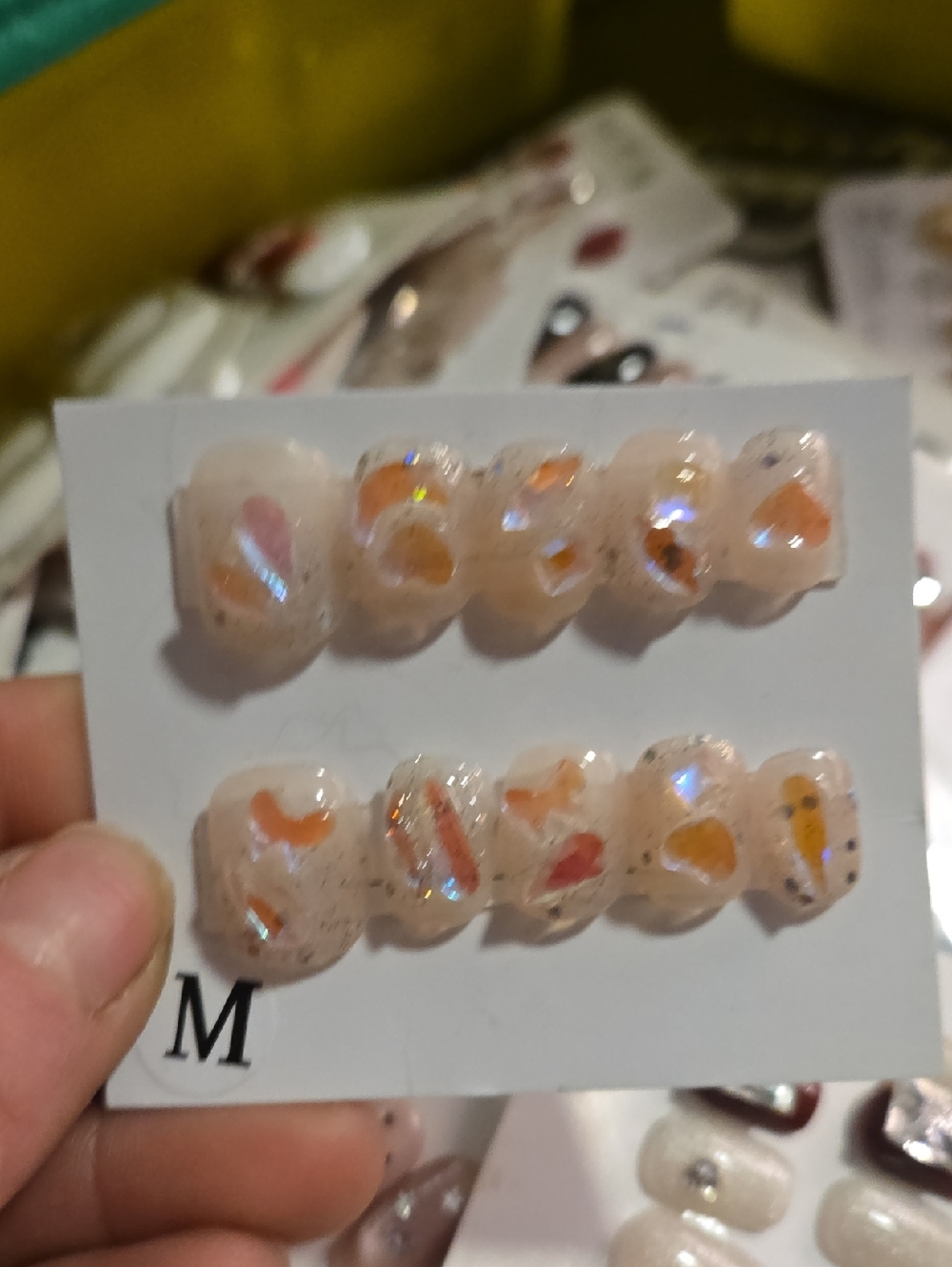 Press-On Nails Set in Sheer Peach with Iridescent Accents
